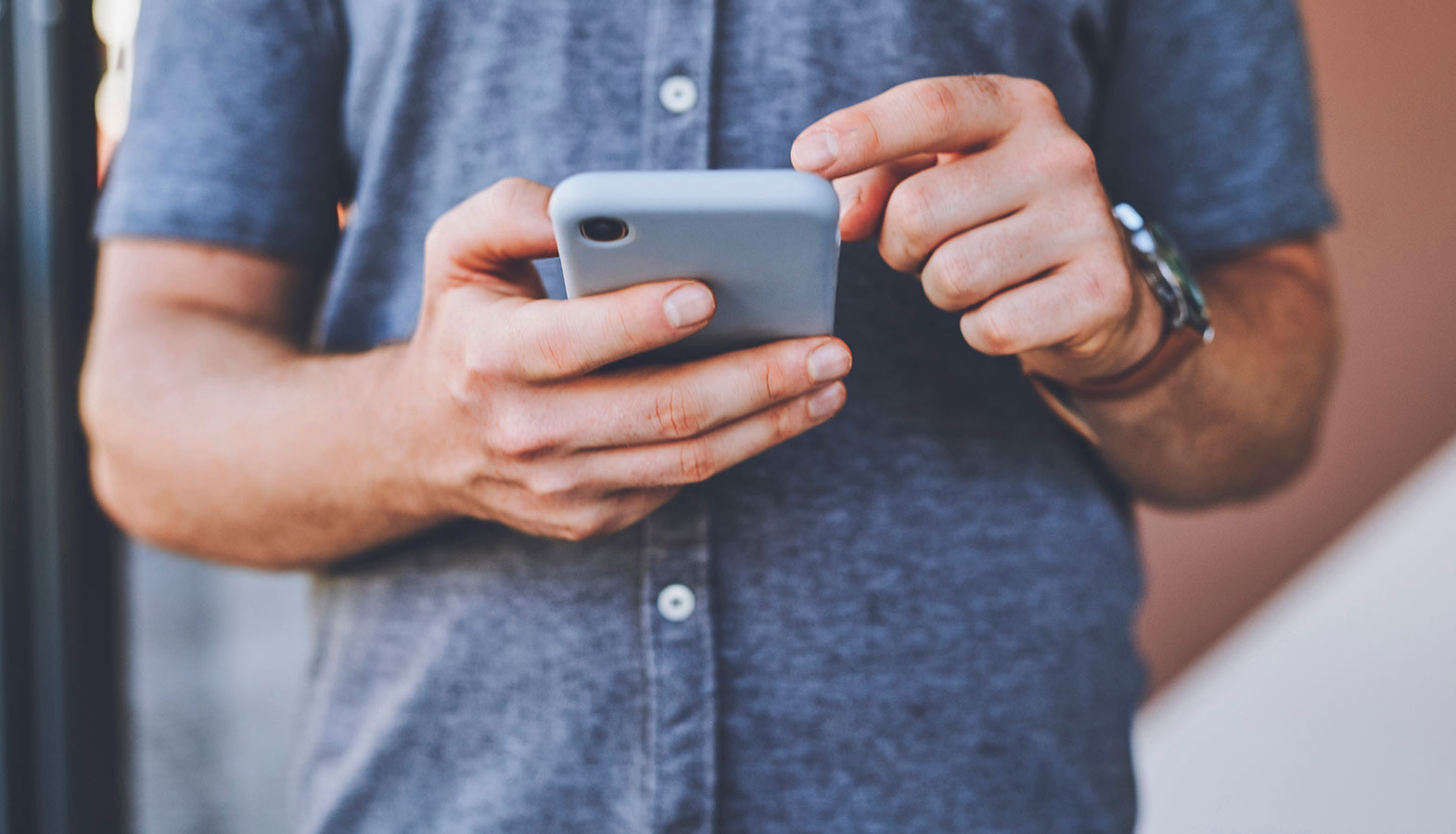 The image shows a smartphone with a web page in the process of loading, displaying a progress indicator. The largest contentful paint element is visible, indicating that the page's main content is beginning to render as the user initiates loading.