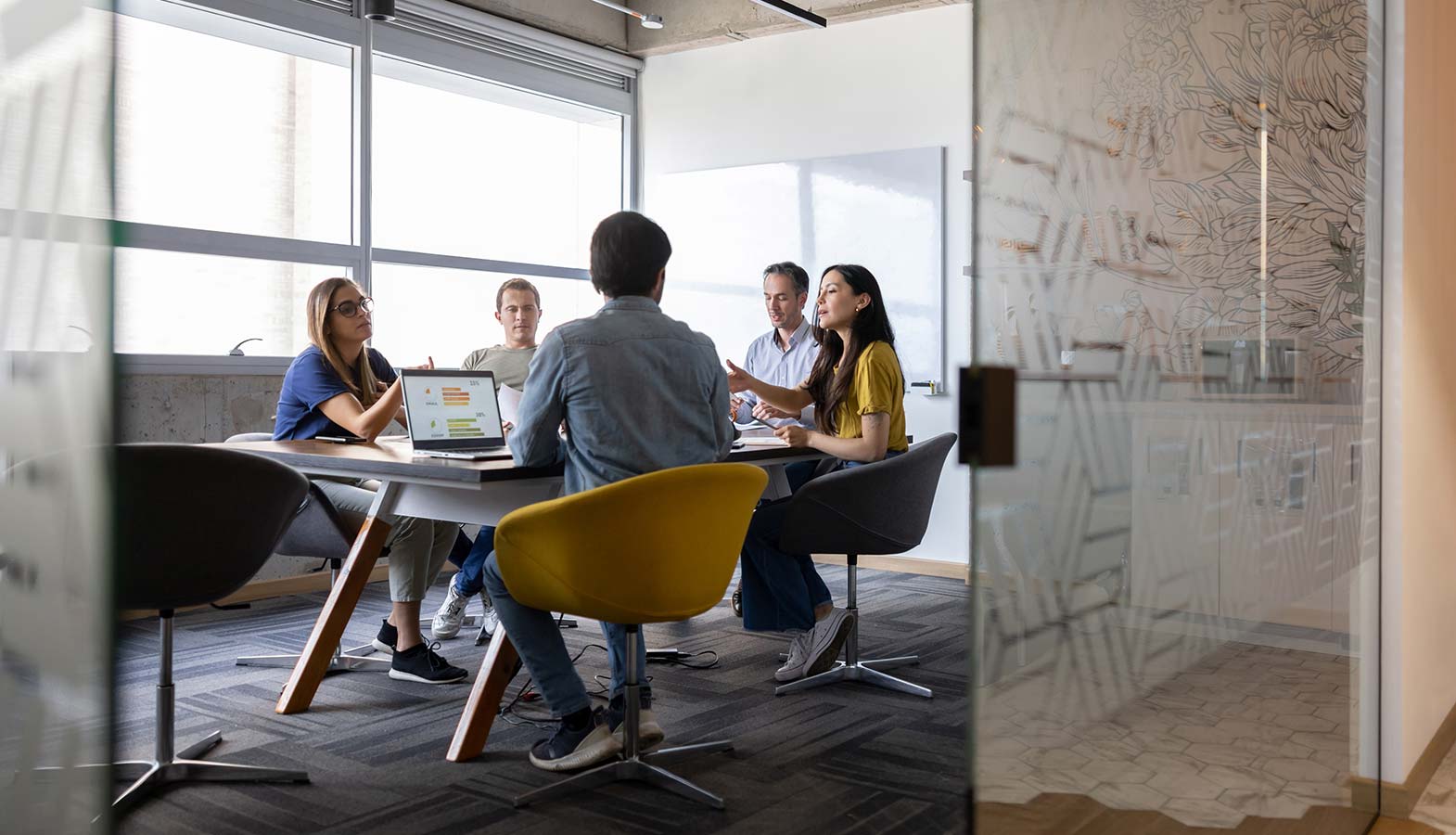 A group of people discussing a creative brief