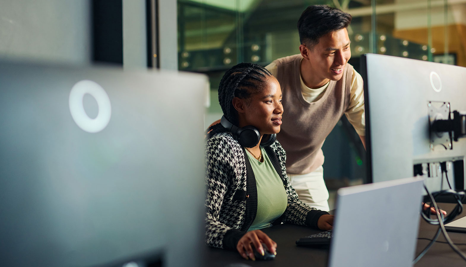 The image depicts a modern office workspace featuring a laptop that is displaying a professional WordPress website. The setup highlights the importance of web development and customization, showcasing a user-friendly interface ideal for managing content on a popular content management system.